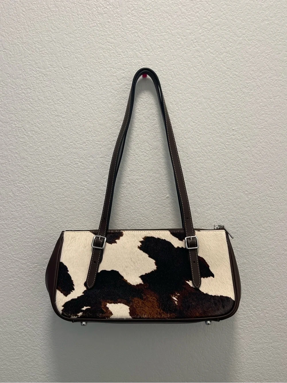 Coach asher cow print